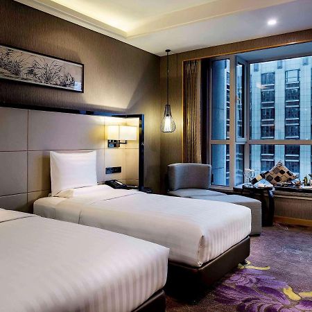 Отель Pullman Qingdao Ziyue Экстерьер фото