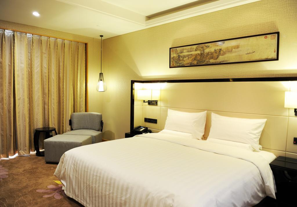 Отель Pullman Qingdao Ziyue Экстерьер фото