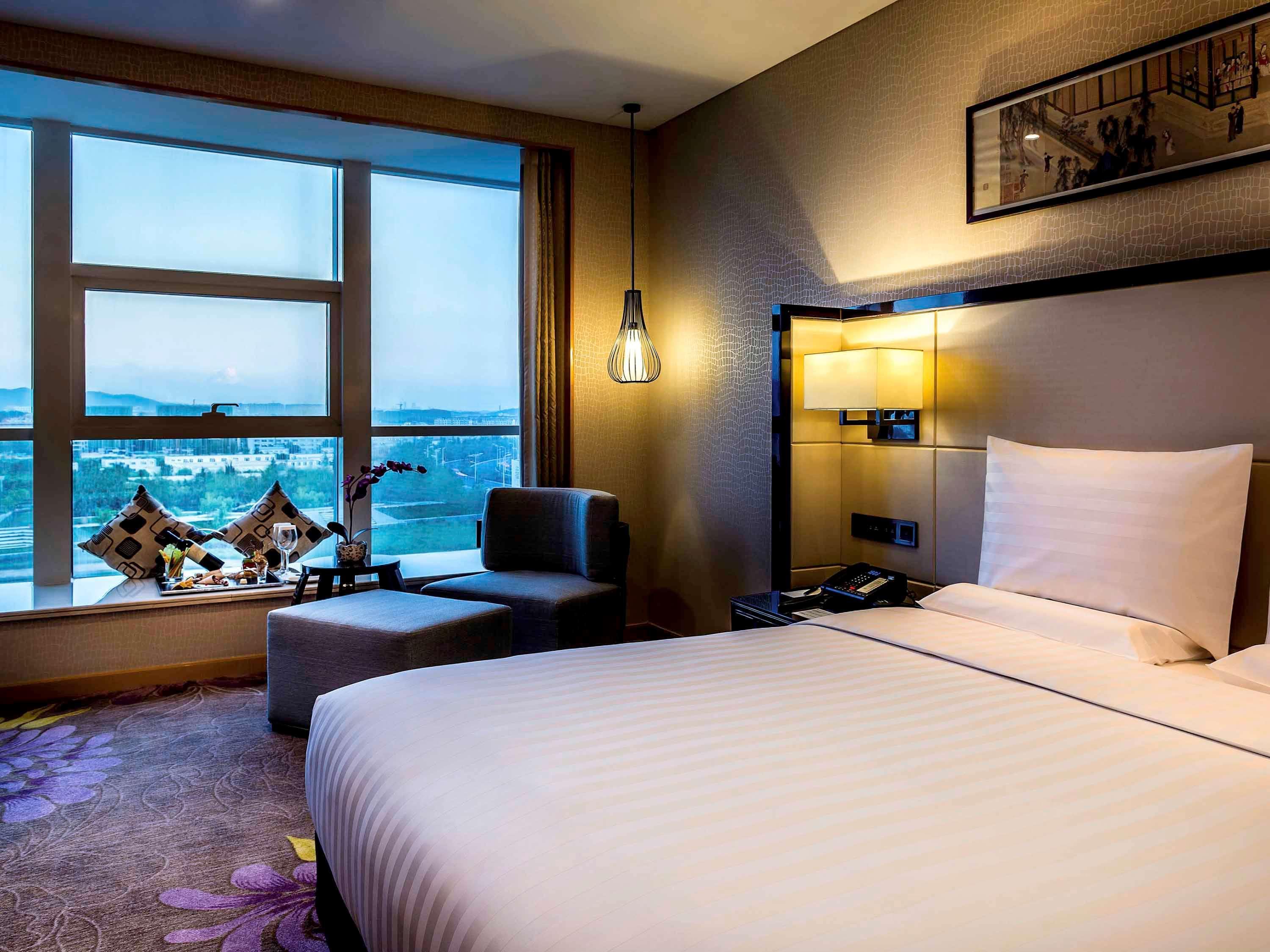 Отель Pullman Qingdao Ziyue Экстерьер фото