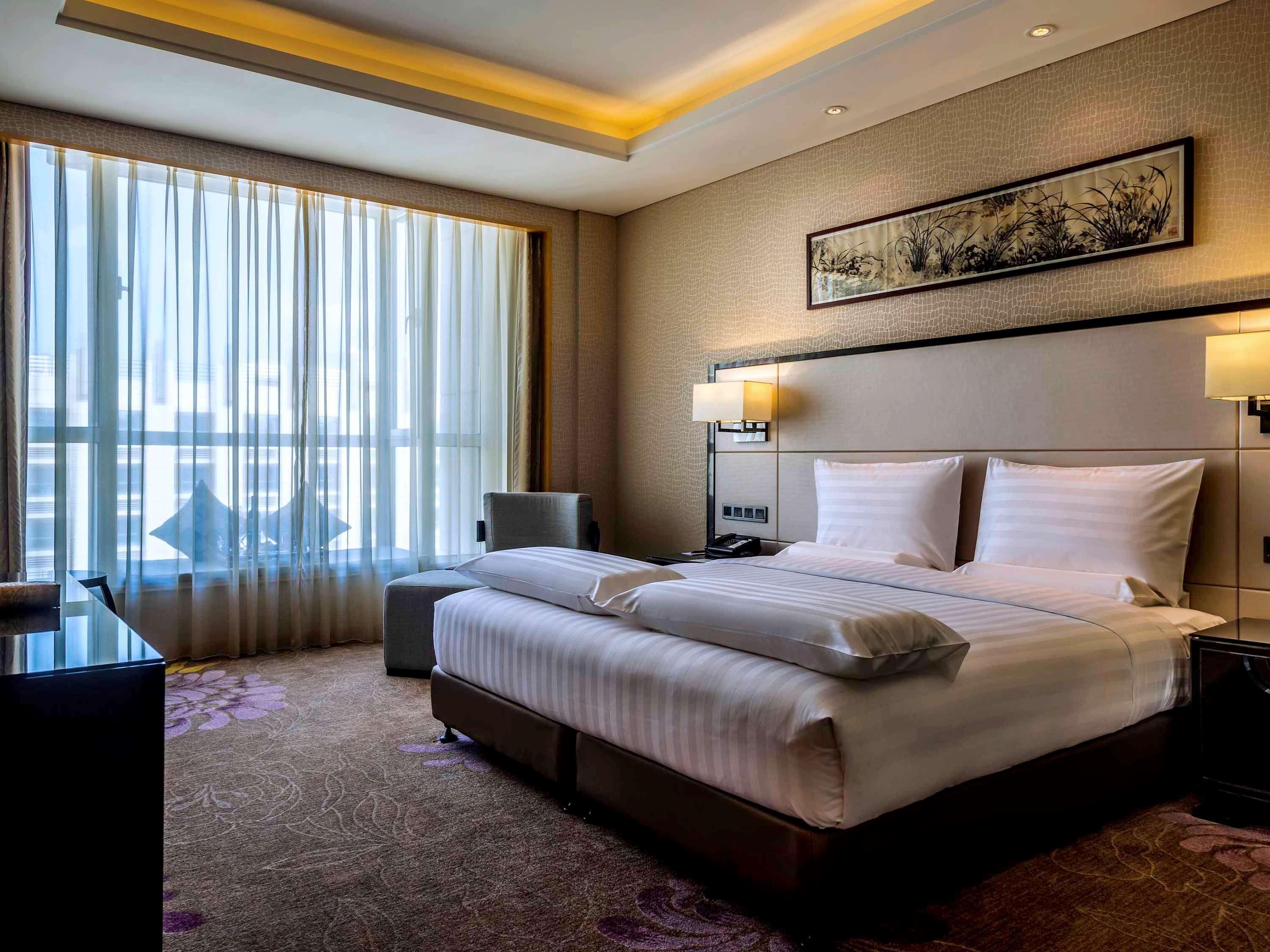 Отель Pullman Qingdao Ziyue Экстерьер фото