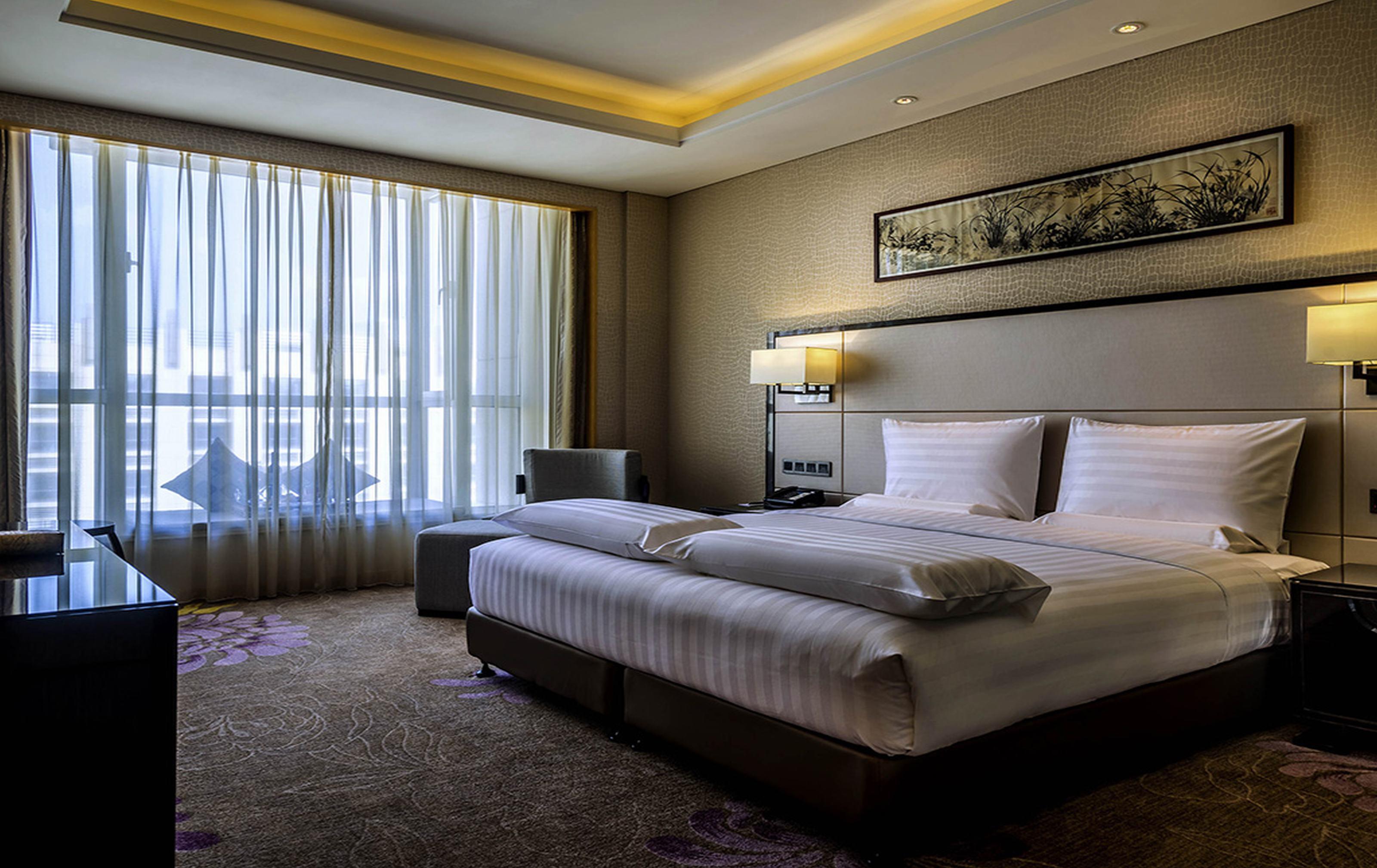 Отель Pullman Qingdao Ziyue Экстерьер фото
