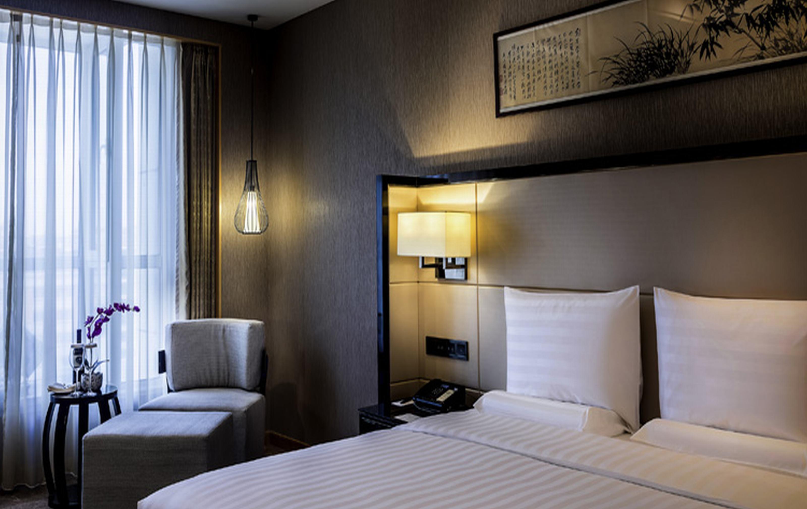 Отель Pullman Qingdao Ziyue Экстерьер фото