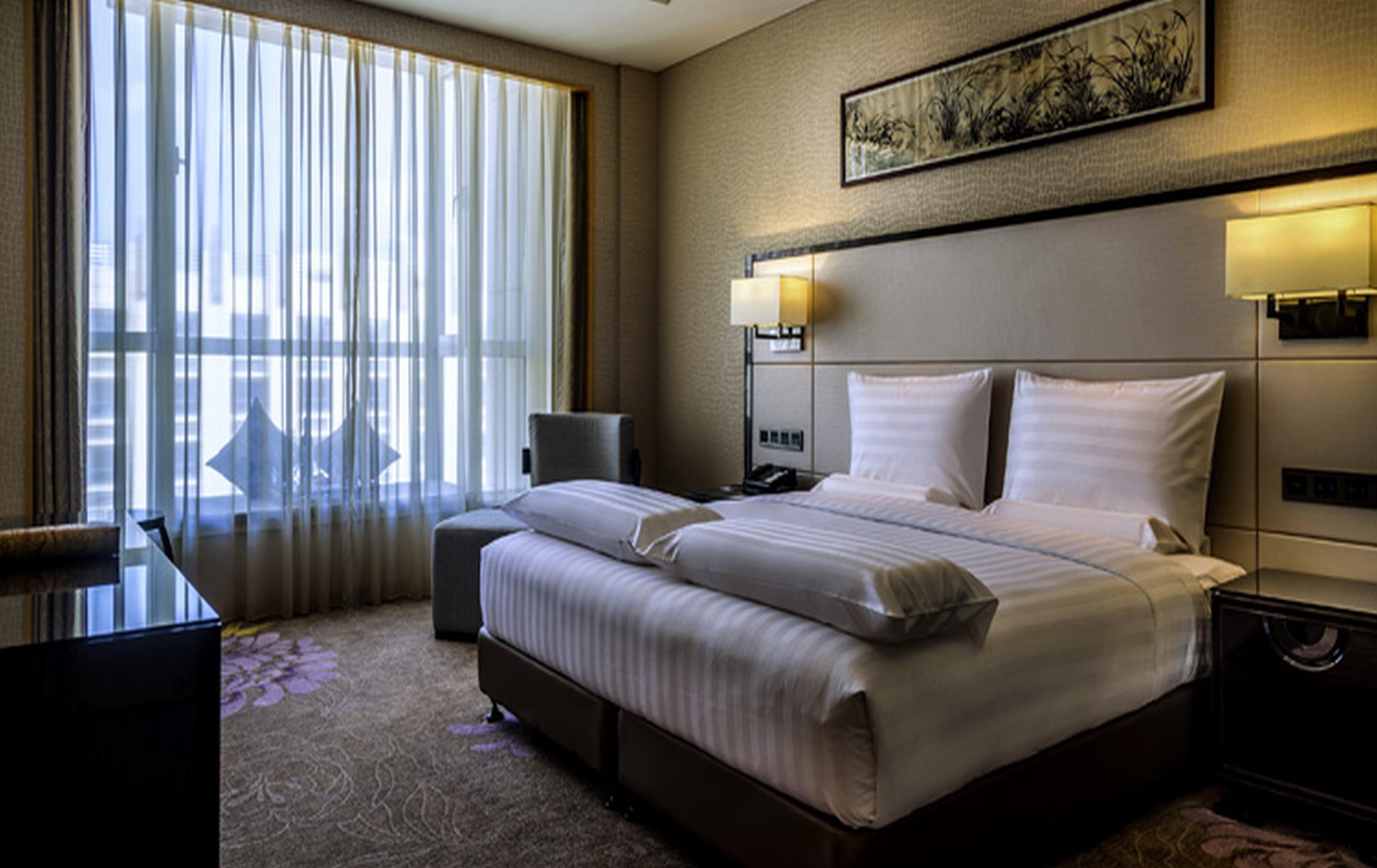 Отель Pullman Qingdao Ziyue Экстерьер фото