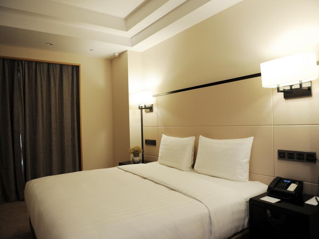 Отель Pullman Qingdao Ziyue Экстерьер фото