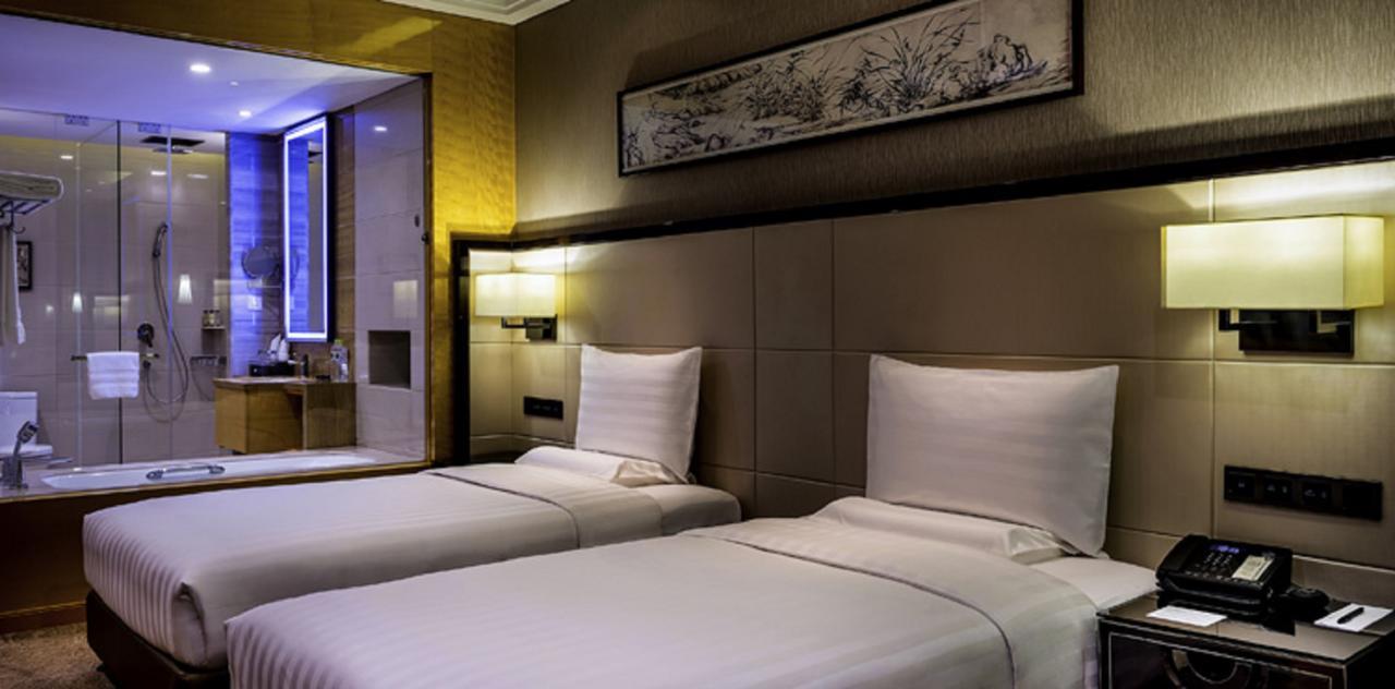 Отель Pullman Qingdao Ziyue Экстерьер фото