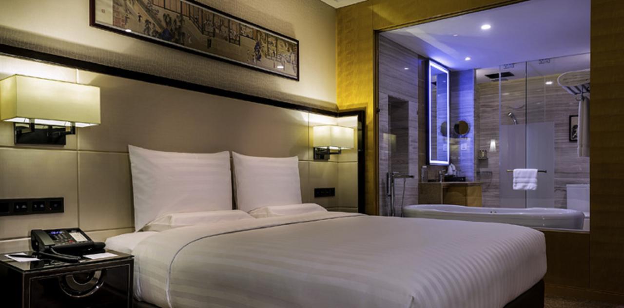 Отель Pullman Qingdao Ziyue Экстерьер фото