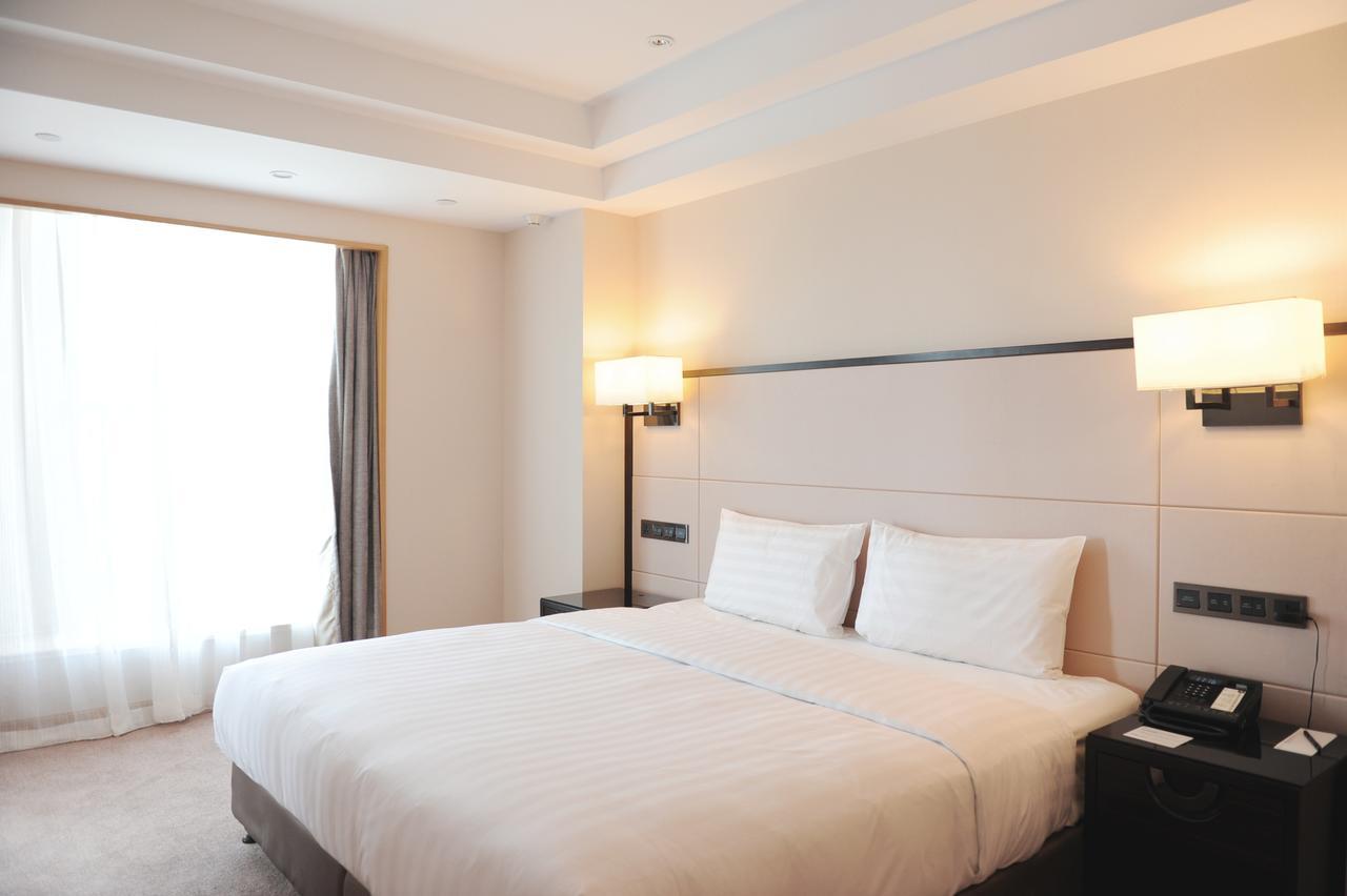 Отель Pullman Qingdao Ziyue Экстерьер фото