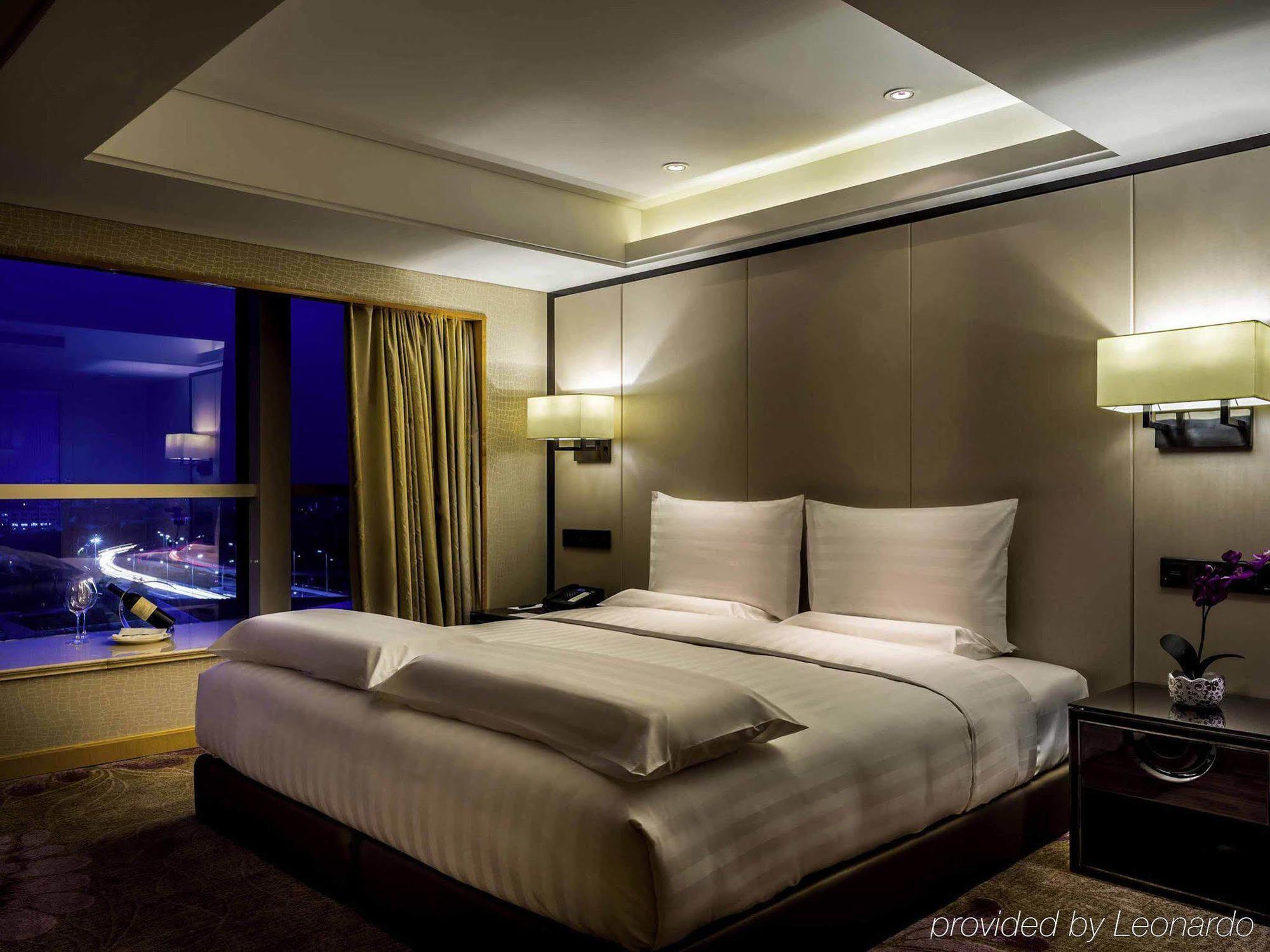 Отель Pullman Qingdao Ziyue Экстерьер фото