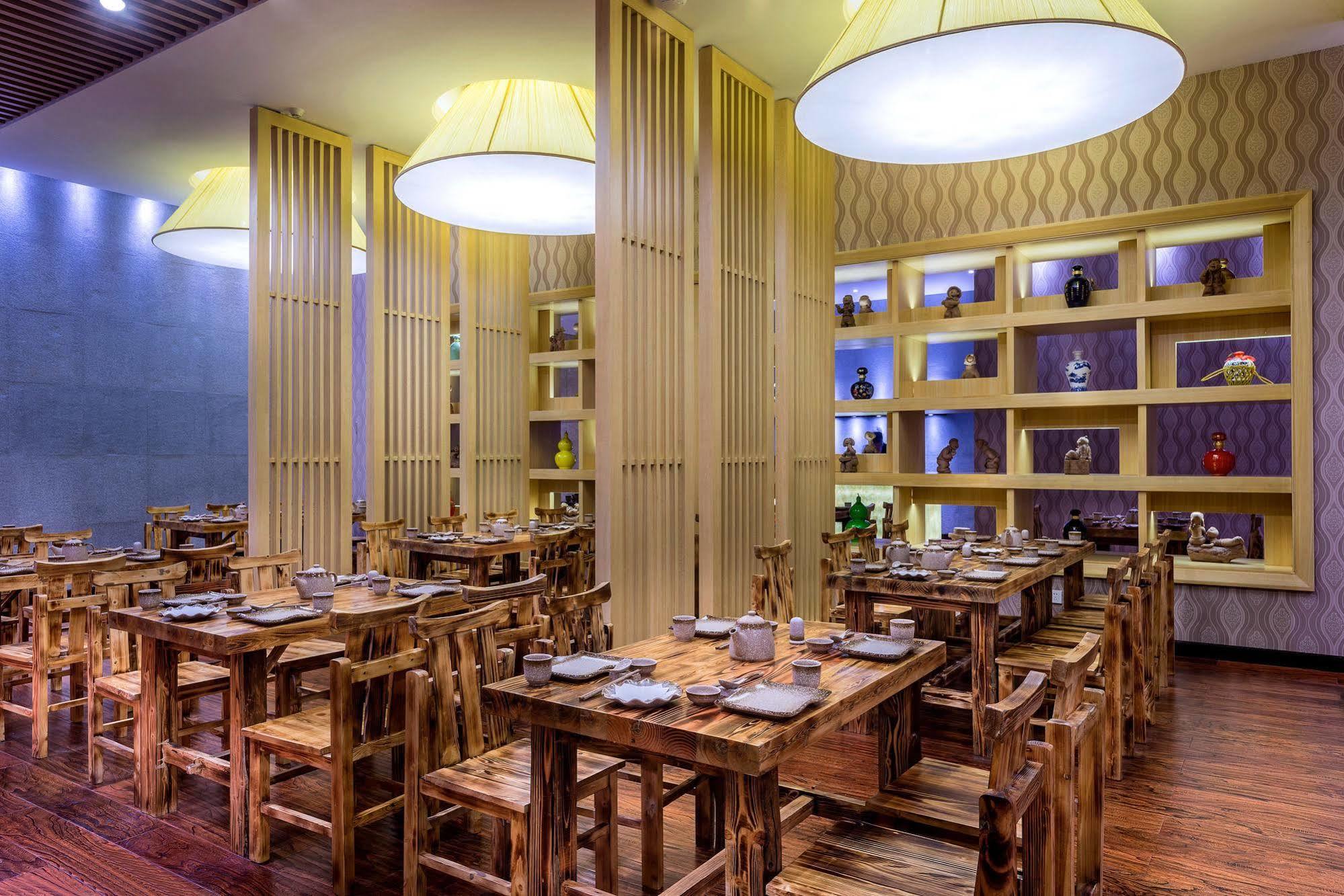 Отель Pullman Qingdao Ziyue Экстерьер фото