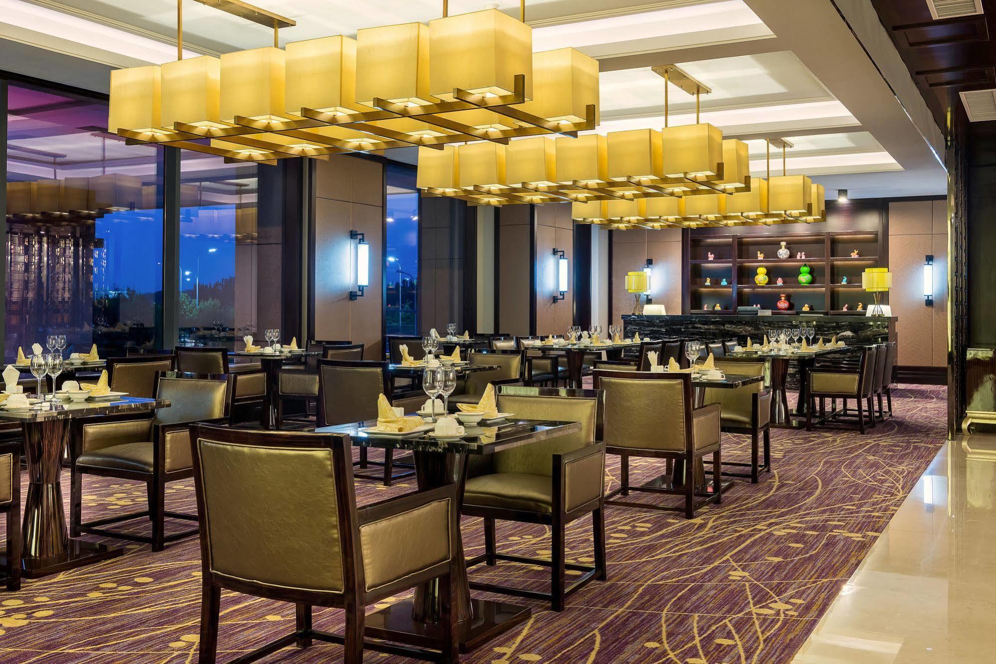 Отель Pullman Qingdao Ziyue Экстерьер фото