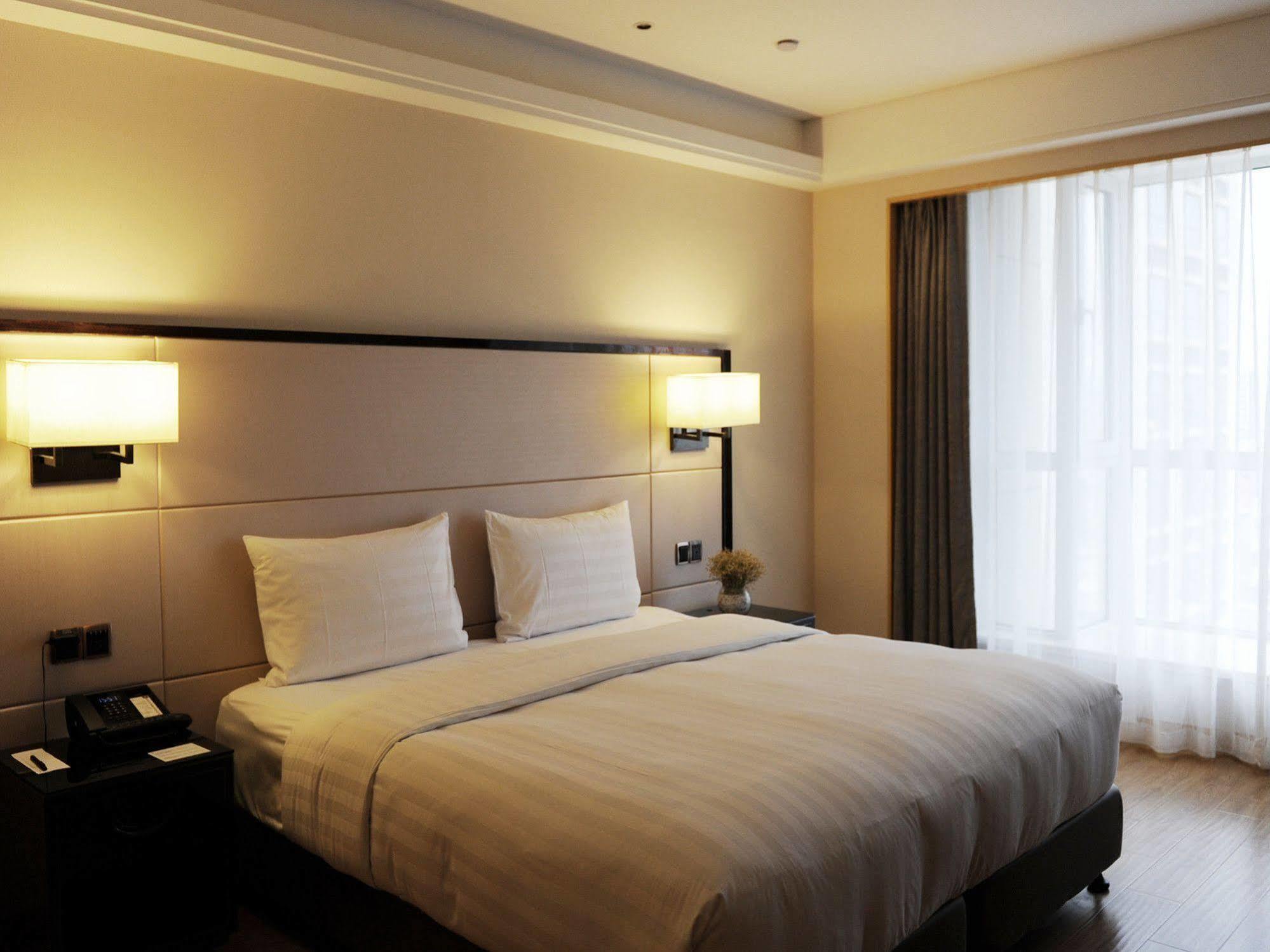 Отель Pullman Qingdao Ziyue Экстерьер фото