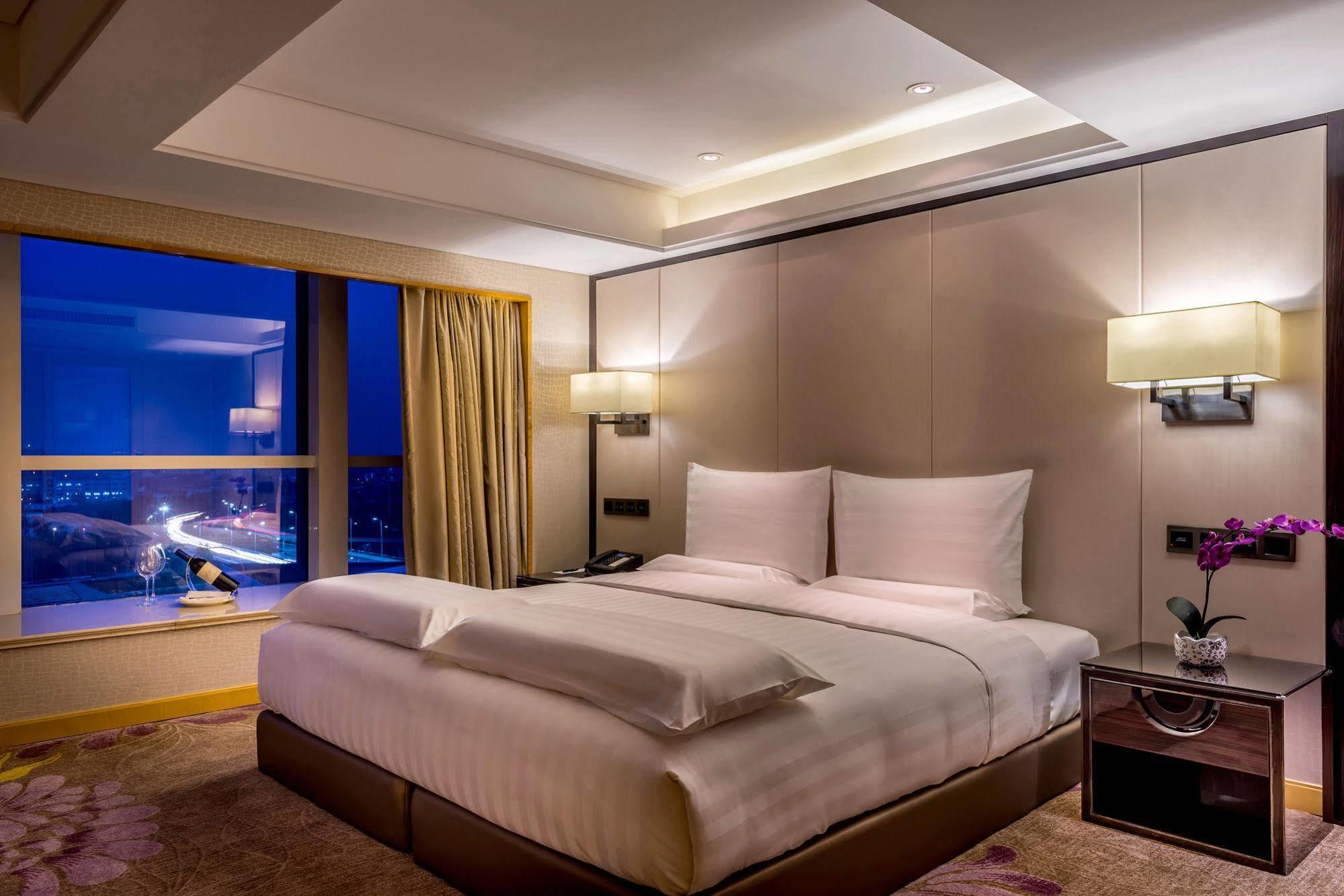 Отель Pullman Qingdao Ziyue Экстерьер фото