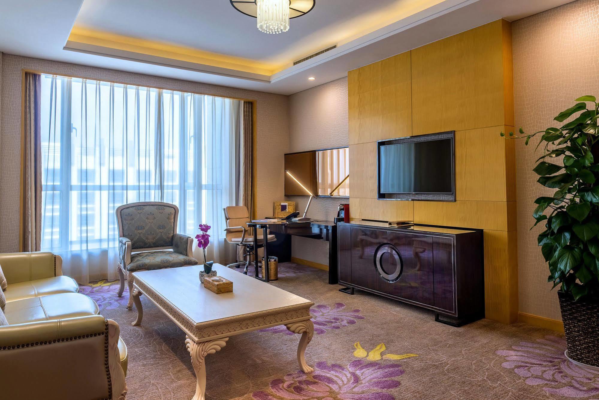Отель Pullman Qingdao Ziyue Экстерьер фото