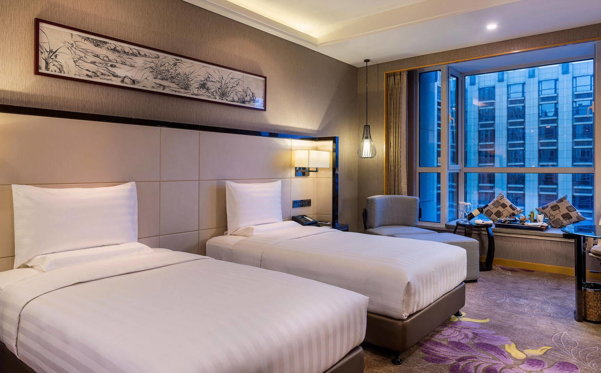 Отель Pullman Qingdao Ziyue Экстерьер фото
